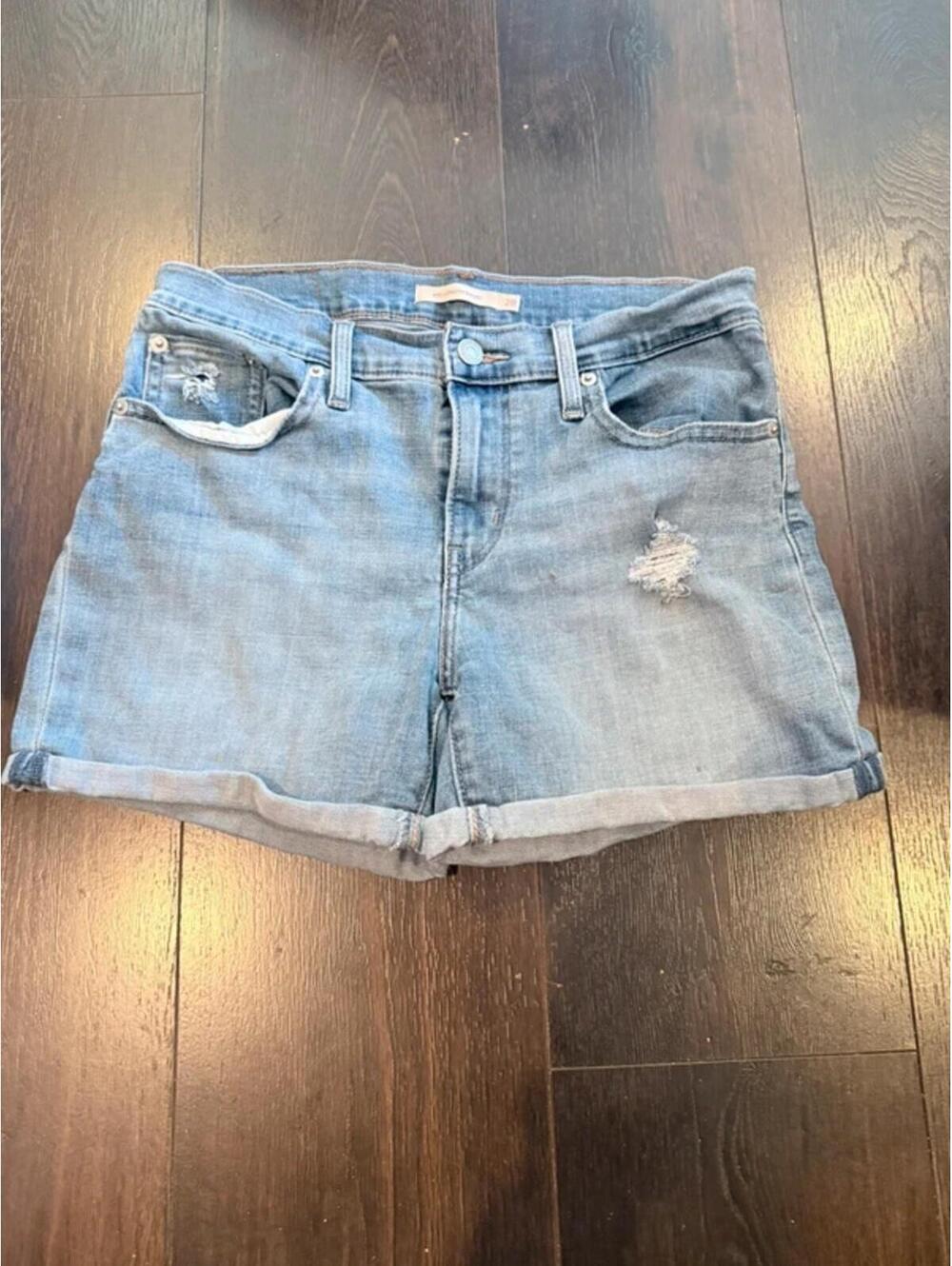 Levi’s Women’s Mid Length Denim Shorts Size 28 Light Wash Distressed S09
